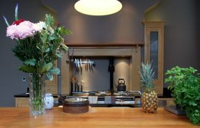 Kitchen fireplace lighting with Aga